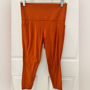 Athleta Stash Pocket II 7/8 Tight- Women’s size Medium-Pumpkin
